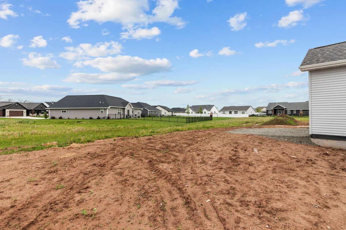 Backyard and neighboring homes surrounding a new construction property in Northern Wisconsin