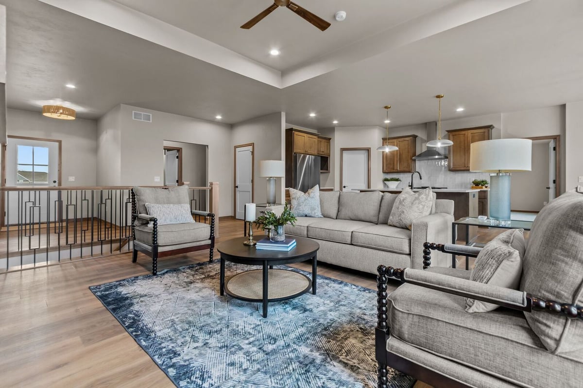 Open-concept Northern Wisconsin living room with kitchen view and contemporary seating area