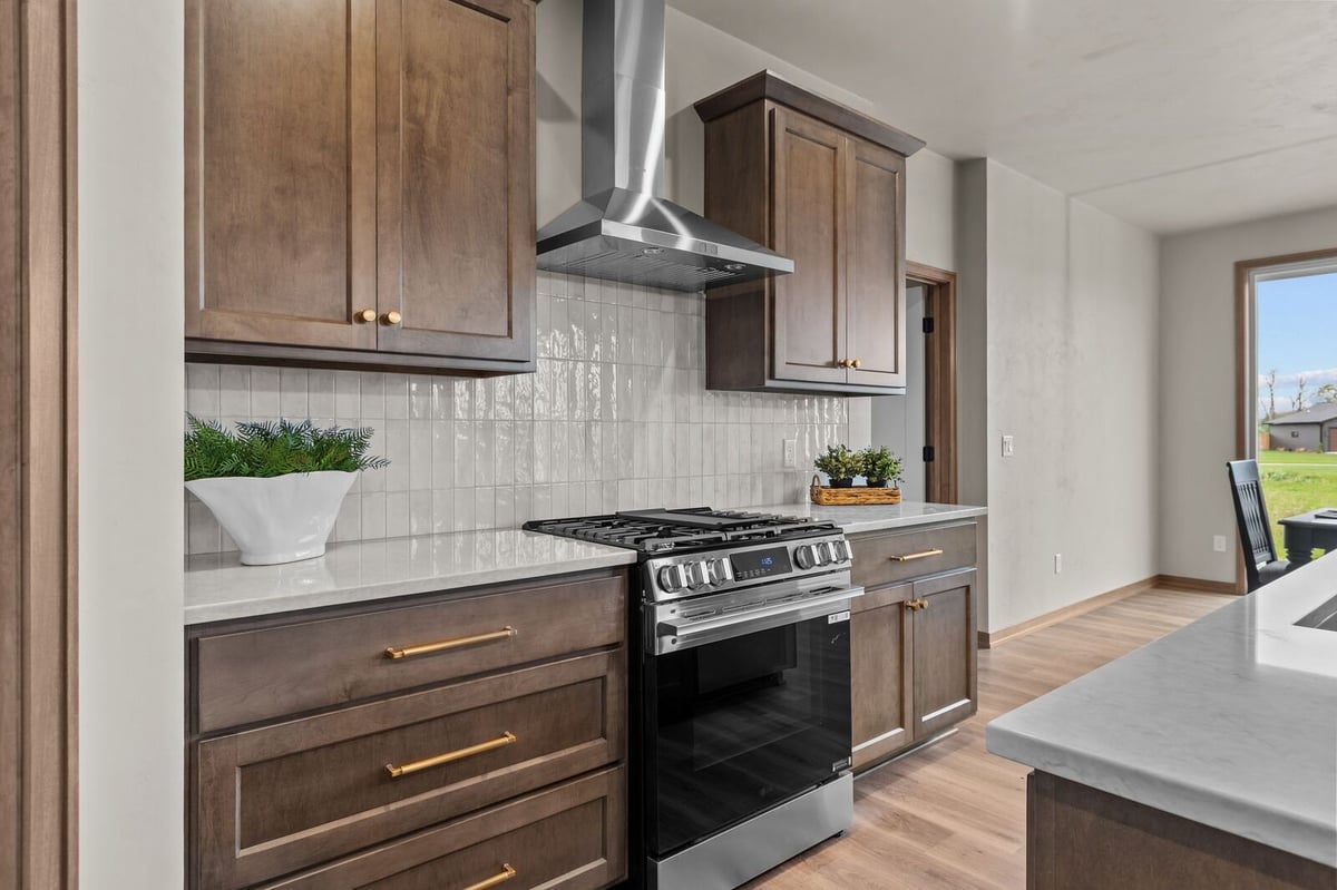 Stylish kitchen with gas range and custom cabinetry in a Northern Wisconsin home