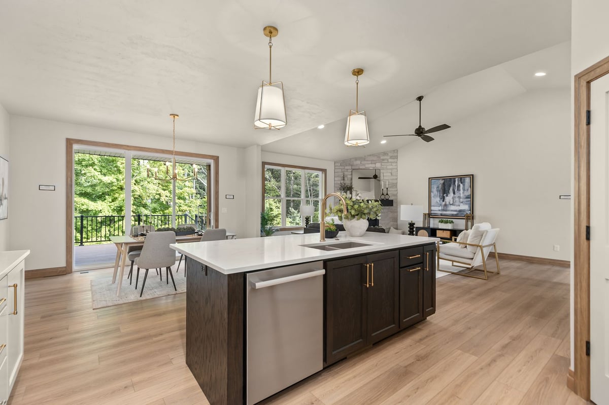 Large kitchen island overlooking the dining and living spaces in a Northeast Wisconsin home