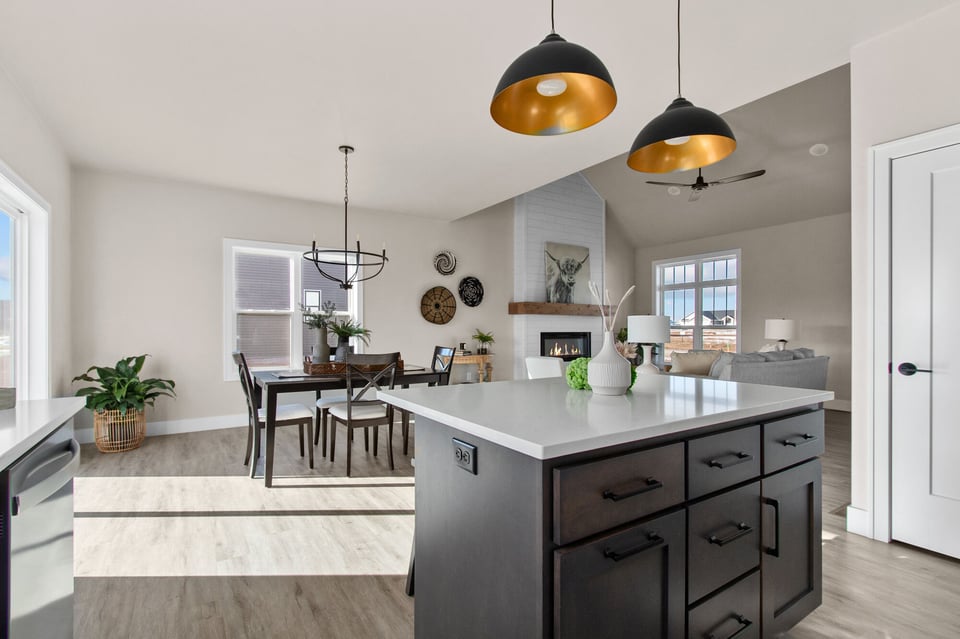 Custom home kitchen and dining room with modern finishes by Midwest Design Homes in Appleton, WI