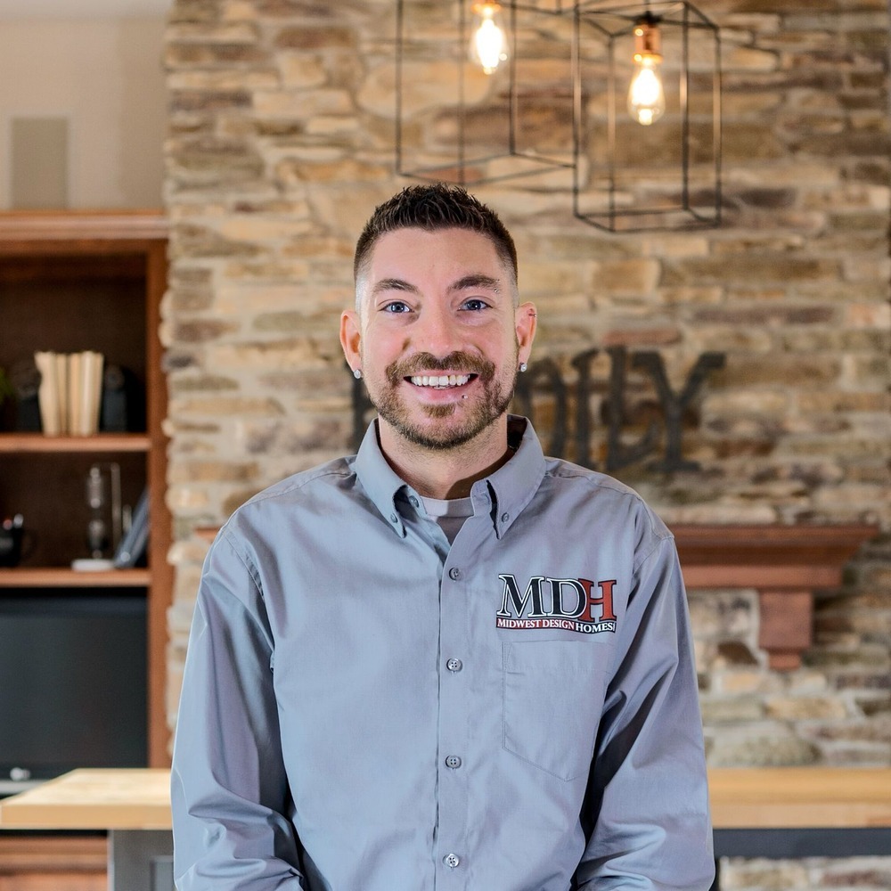 Midwest Design Homes male builder inside Kaukauna, WI custom home living room