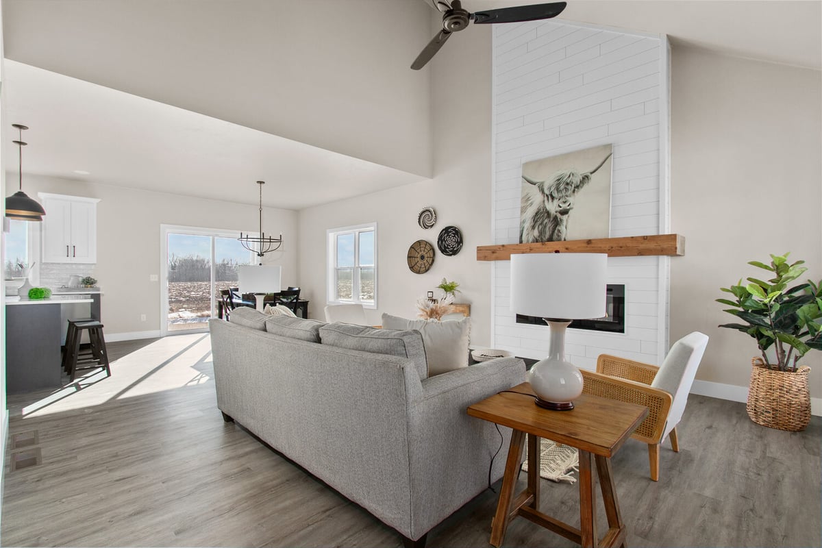 Open living space connecting to kitchen and dining in Midwest Design Homes custom home in Appleton, WI