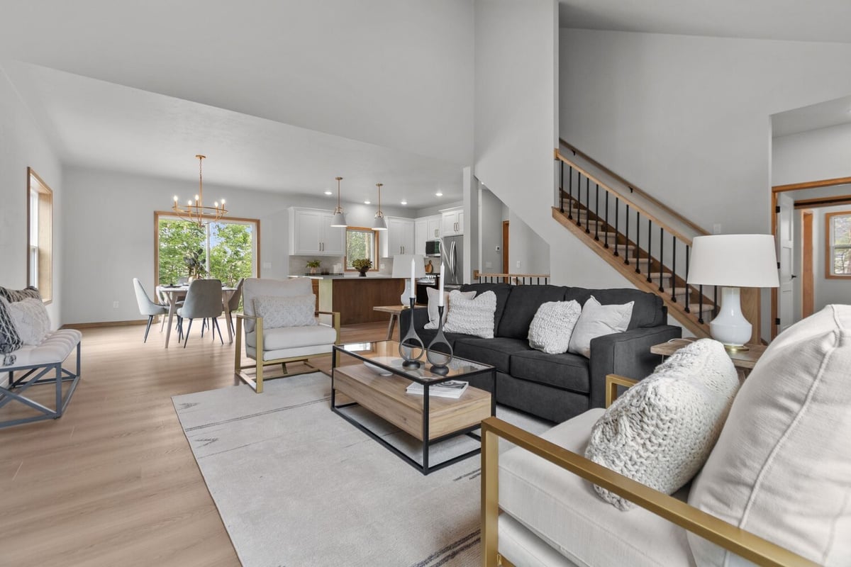 Spacious living room and kitchen layout in a new Fox Cities WI custom home by Midwest Design Homes