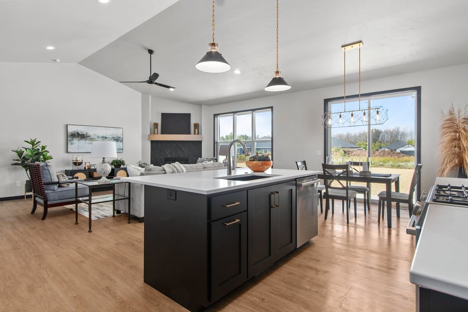 Modern kitchen island with pendant lights in custom home built in Appleton, WI by Midwest Design Homes