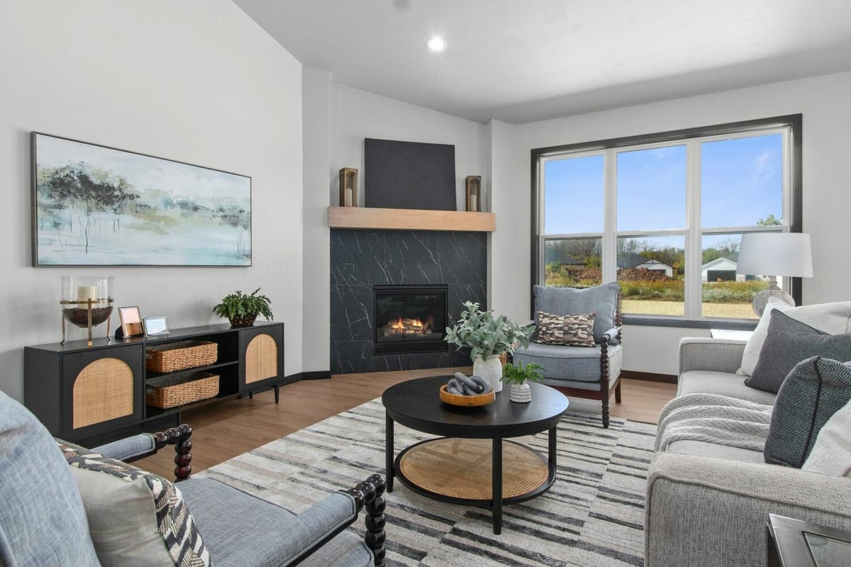 Custom home featuring bright living space by Midwest Design Homes in Ellington, WI