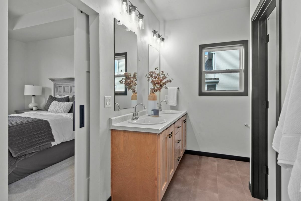Custom-built bathroom connected to bedroom by Midwest Design Homes in Ledgeview, WI