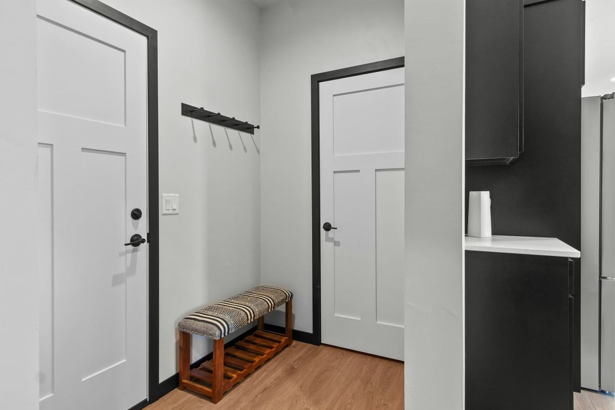 Mudroom with bench seating in custom home by Midwest Design Homes in Ellington, WI