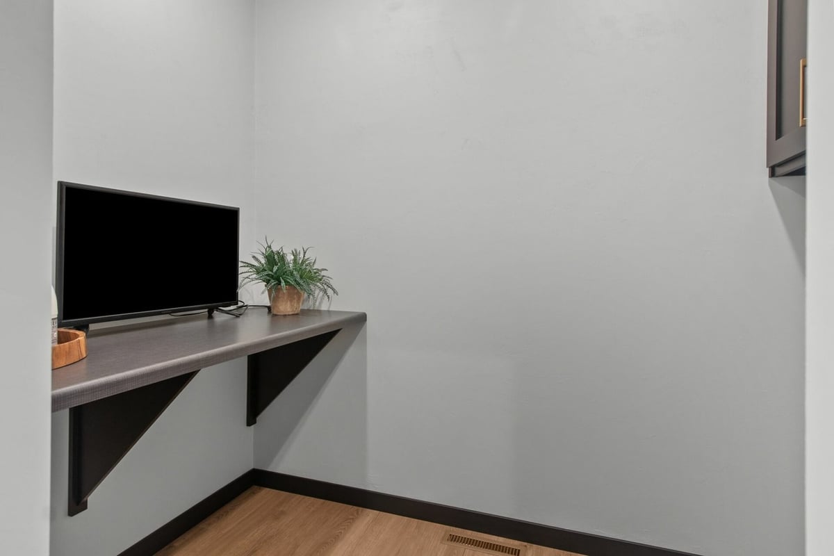 Small home office with modern finishes by Midwest Design Homes in Lawrence, WI