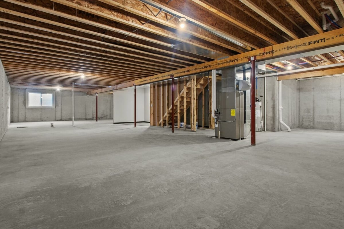 Spacious unfinished basement in custom home by Midwest Design Homes in Bellevue, WI