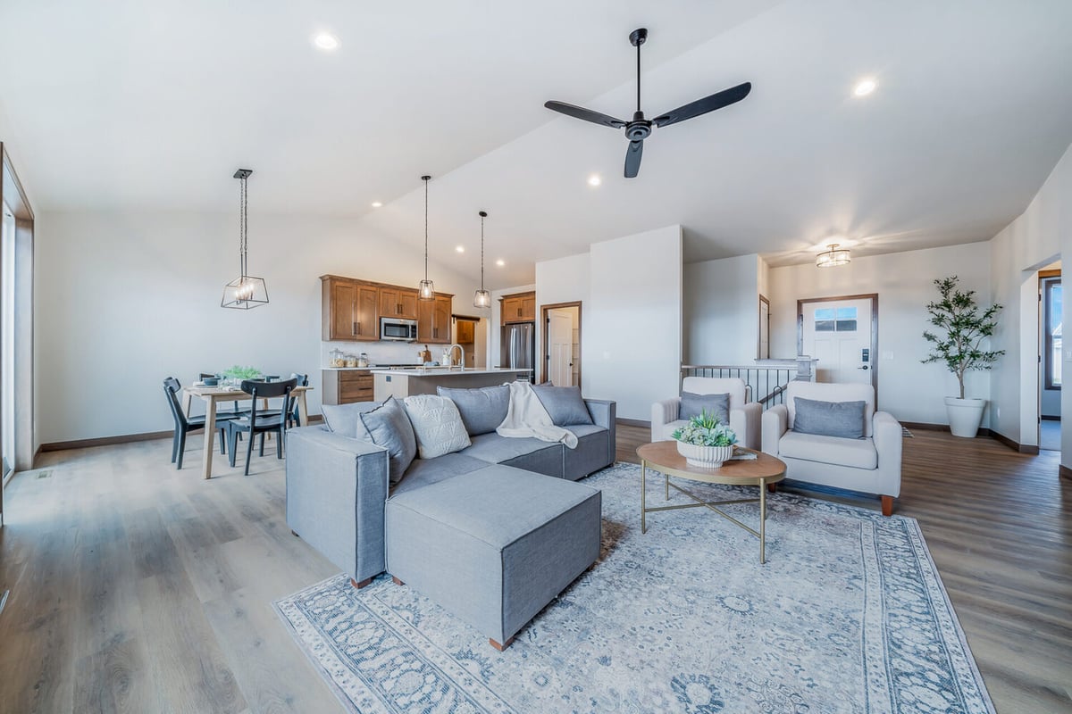 Full view of living room, kitchen, and dining in a custom Midwest Design Homes home in Kaukauna, WI