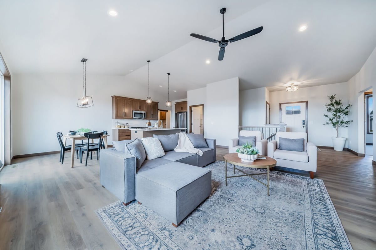 Open layout showcasing living, dining, and kitchen areas in a custom Fox Cities, WI home by Midwest Design Homes
