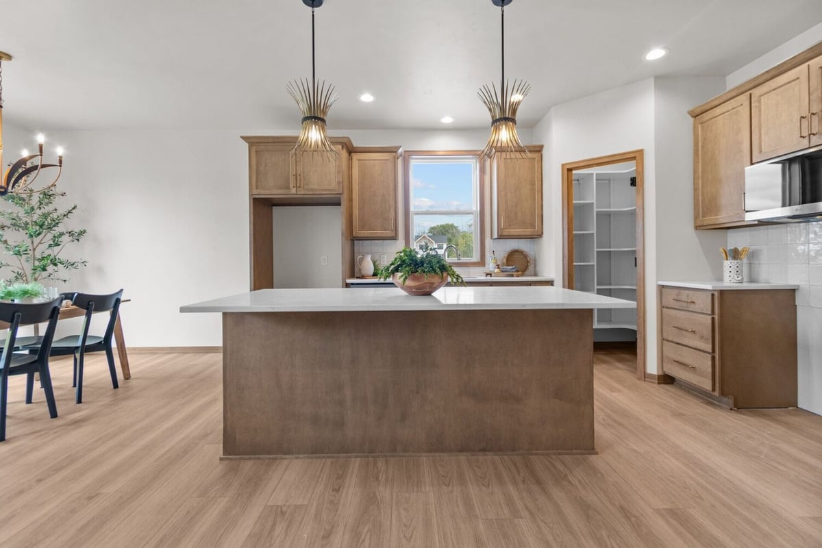 Elegant and spacious kitchen area in a Midwest Design Homes custom Wisconsin residence