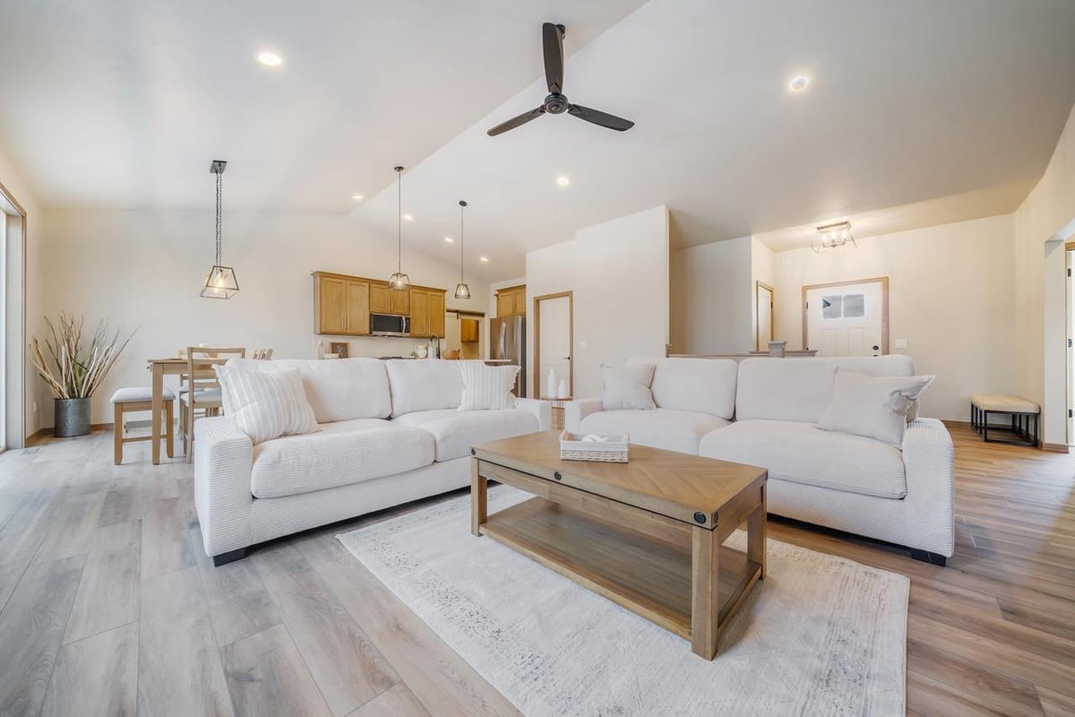 Open concept living room and kitchen with vaulted ceiling in the Fox Cities