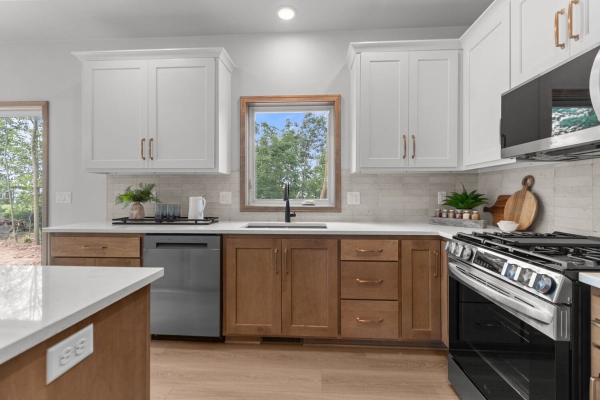 Kitchen window with backyard view in a Lawrence, WI custom home by Midwest Design Homes