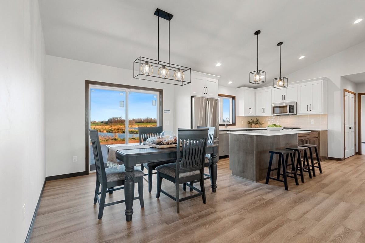 Dining room with outdoor views in a Midwest Design Homes custom home in Kaukauna, WI