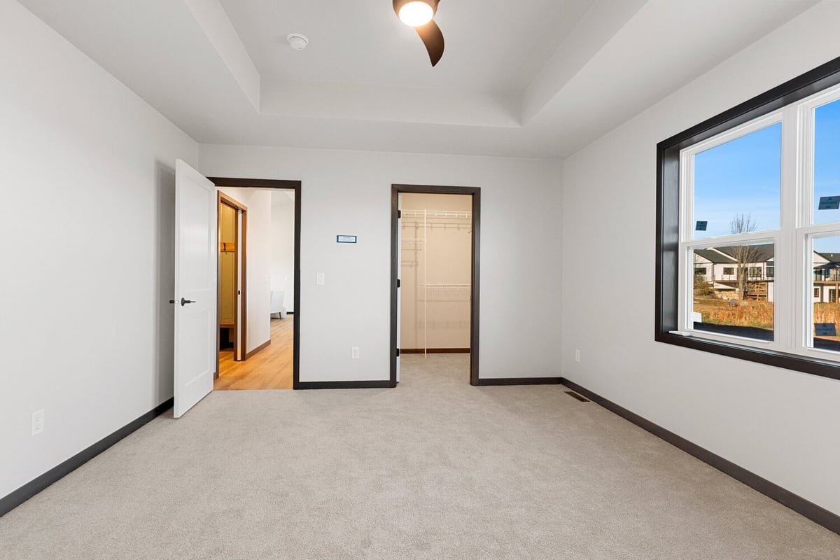 Empty bedroom with natural light in a Midwest Design Homes custom home in Kaukauna, WI