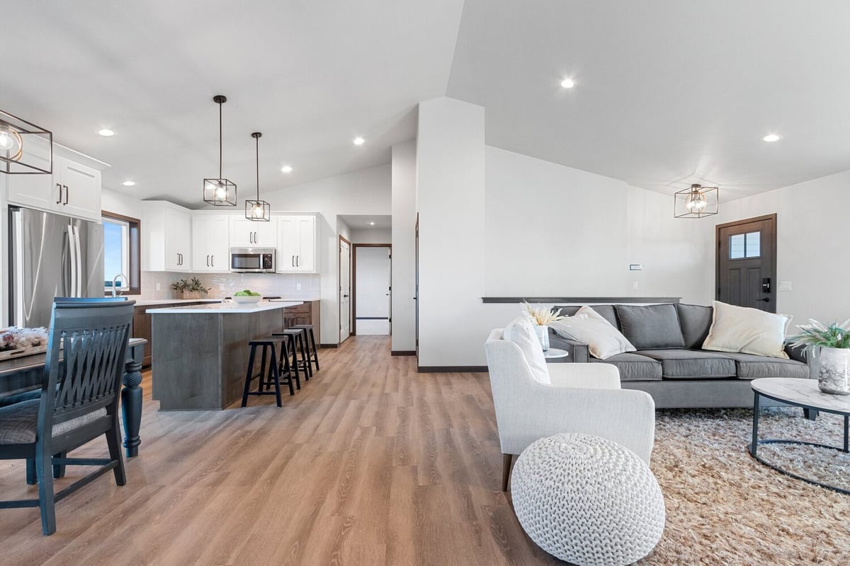 Open kitchen and dining area in a Midwest Design Homes custom home in Kaukauna, WI