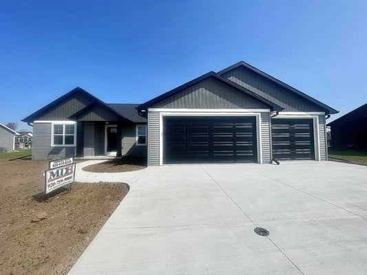 Custom home with three-car garage built by Midwest Design Homes in Kaukauna, WI