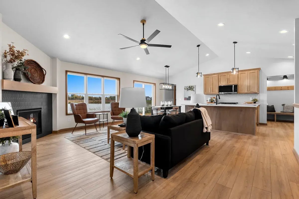 Open-concept living room and kitchen with modern finishes and lake views, located in the Fox Cities