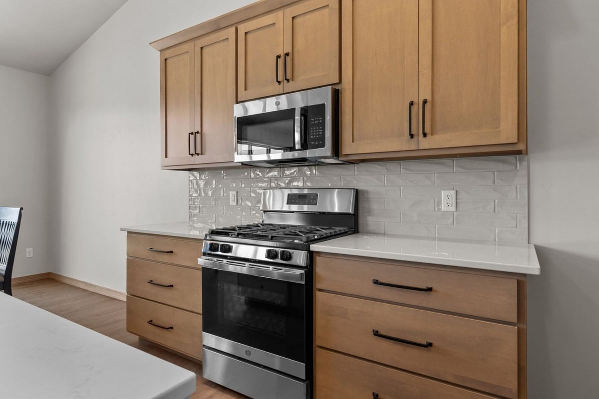 Kitchen with stainless steel appliances by Midwest Design Homes in Greenville, WI