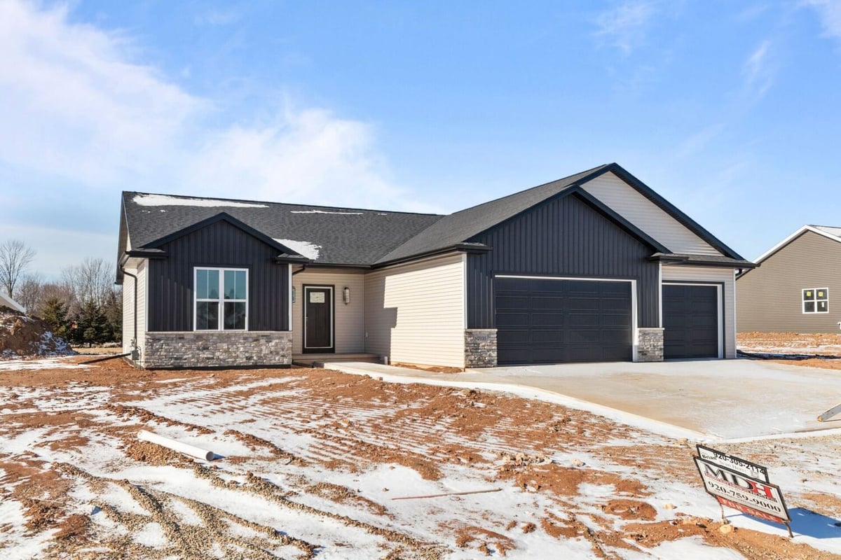 New construction home with attached garage built by Midwest Design Homes in Fremont, WI