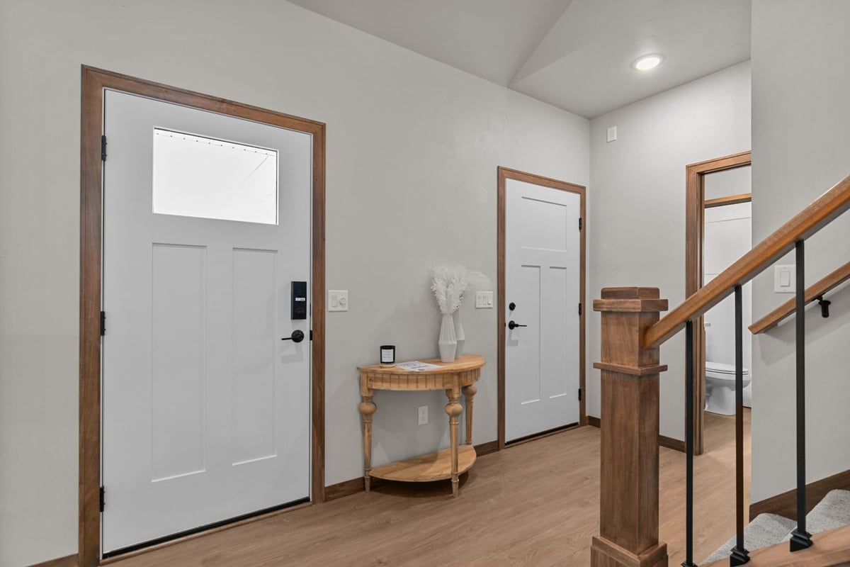 Entryway of a Midwest Design Homes custom home featuring wood trim in Appleton, WI