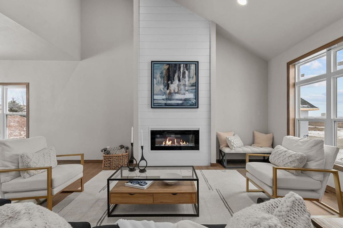 Fireplace wall with shiplap design in a custom home by Midwest Design Homes in Ledgeview, WI