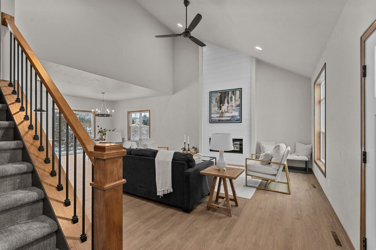 Living room with vaulted ceiling in a custom-built home by Midwest Design Homes in De Pere, WI