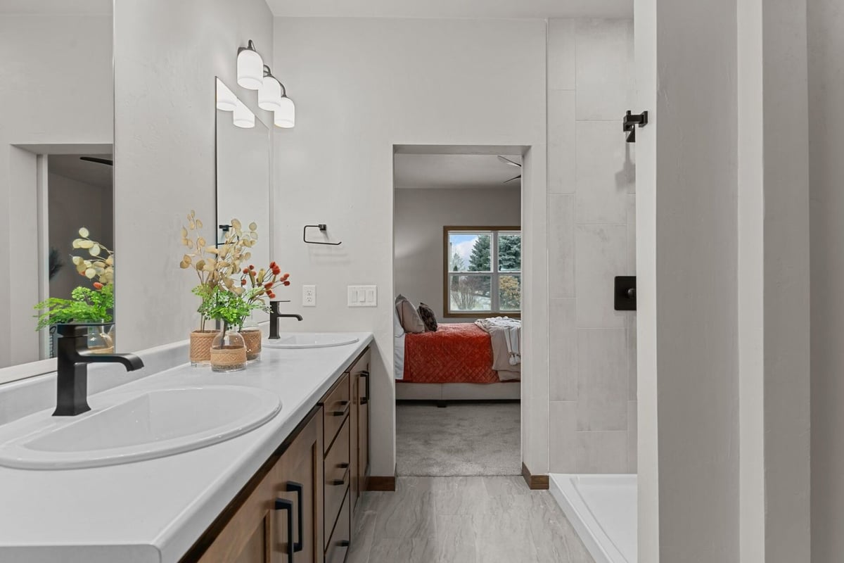 View from bathroom into master bedroom in a custom home by Midwest Design Homes in Neenah, WI
