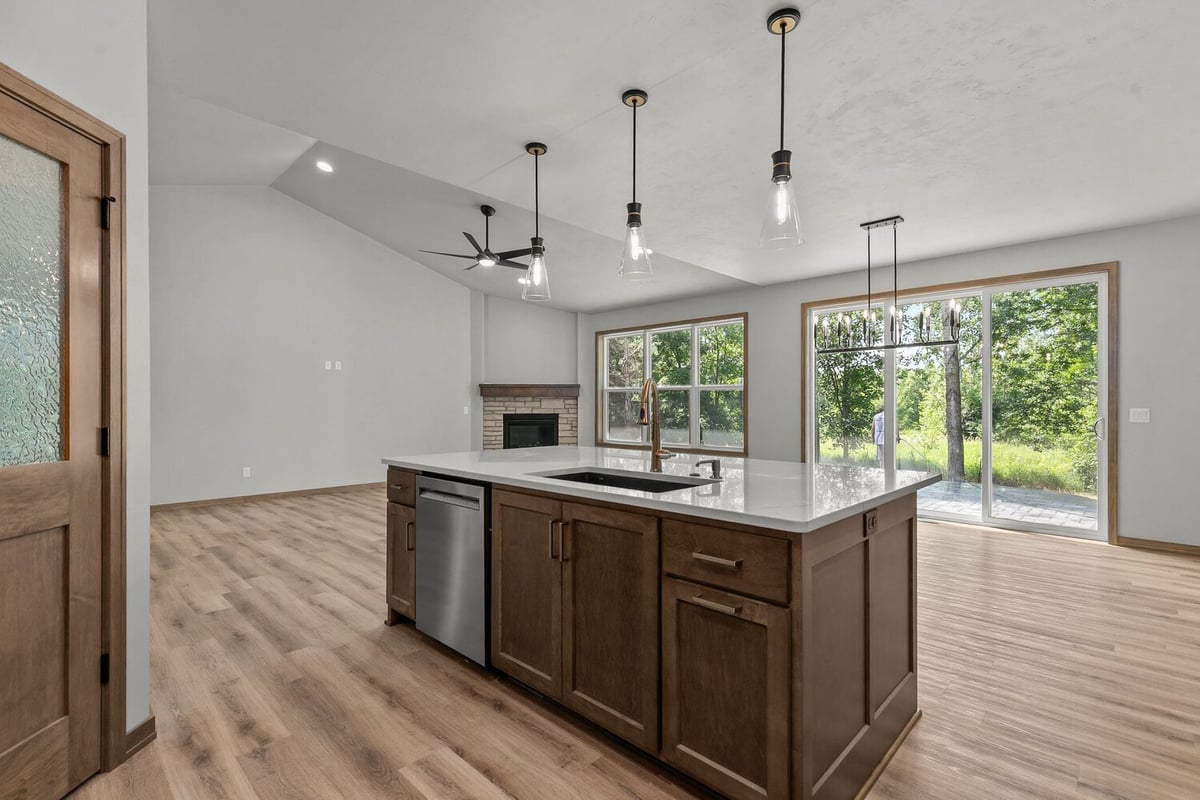 Island sink and natural light in custom home by Midwest Design Homes in Green Bay, WI