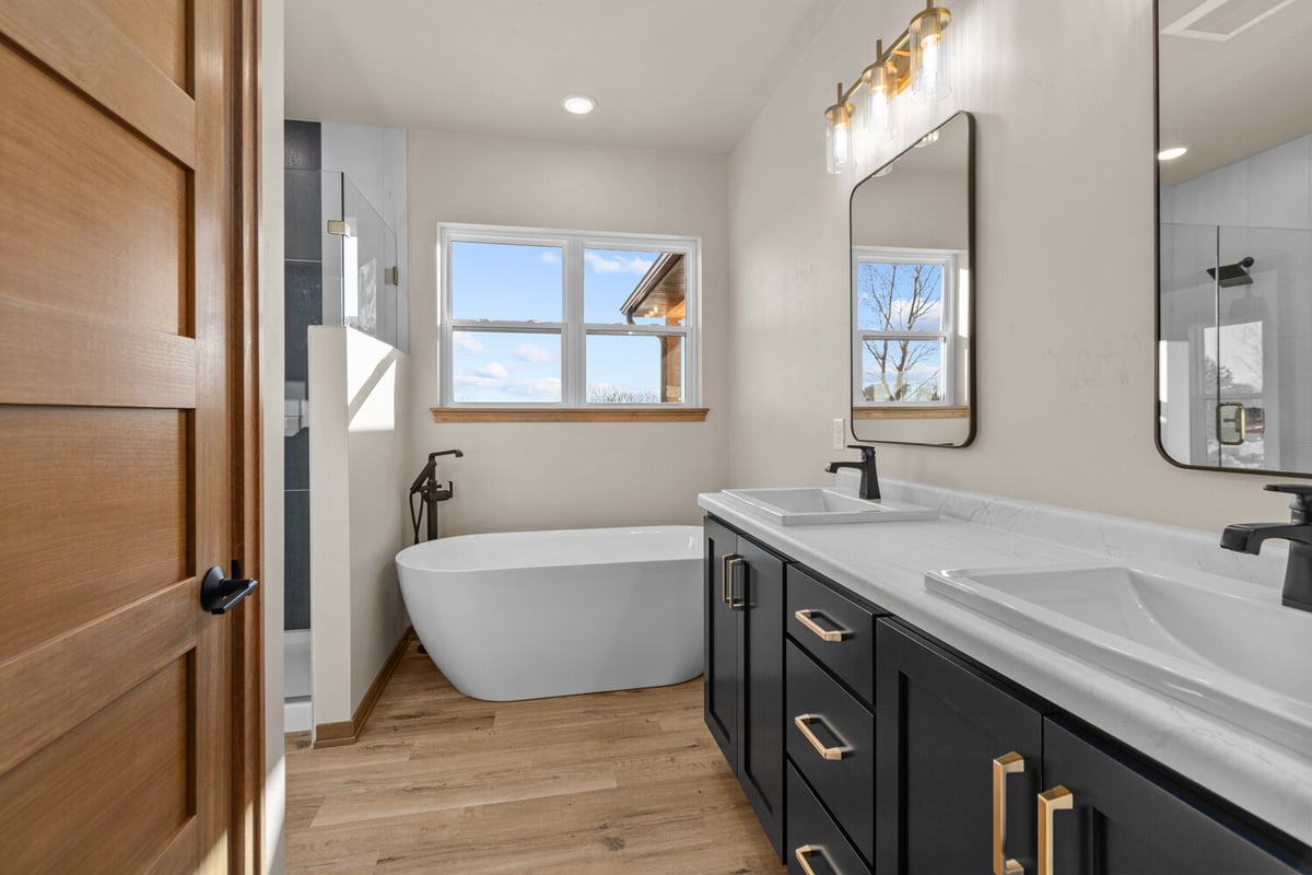 Bathroom and freestanding tub in Kaukauna custom home by Midwest Design Homes