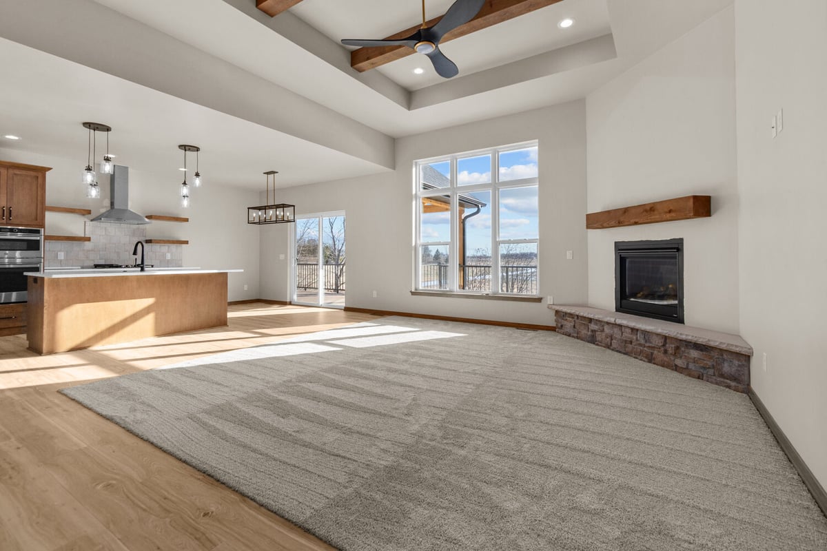 Spacious kitchen and open living room in custom-built home in Ledgeview, WI