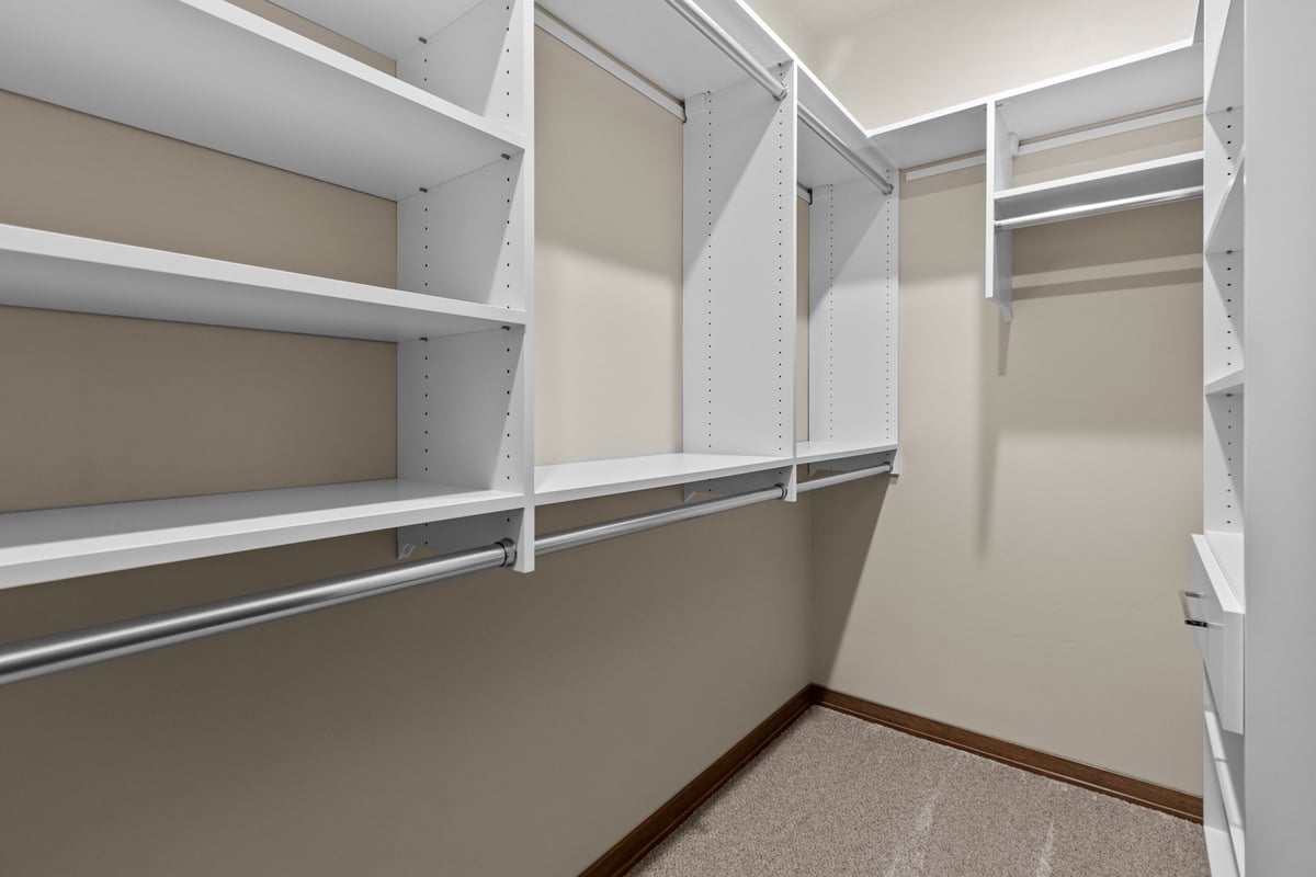 White built-in closet system in Kaukauna by Midwest Design Homes, Wisconsin