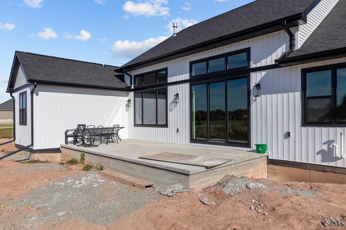 Back patio under construction in Kaukauna custom home by Midwest Design Homes