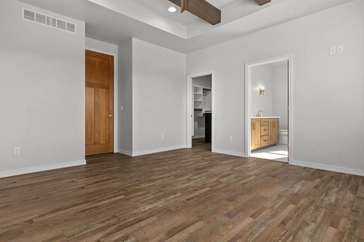 Bedroom with bath and closet entry by Midwest Design Homes in Greenville, Wisconsin