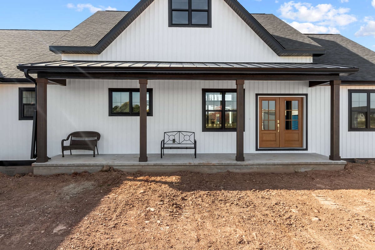 Covered porch on custom home in Kaukauna, WI by Midwest Design Homes