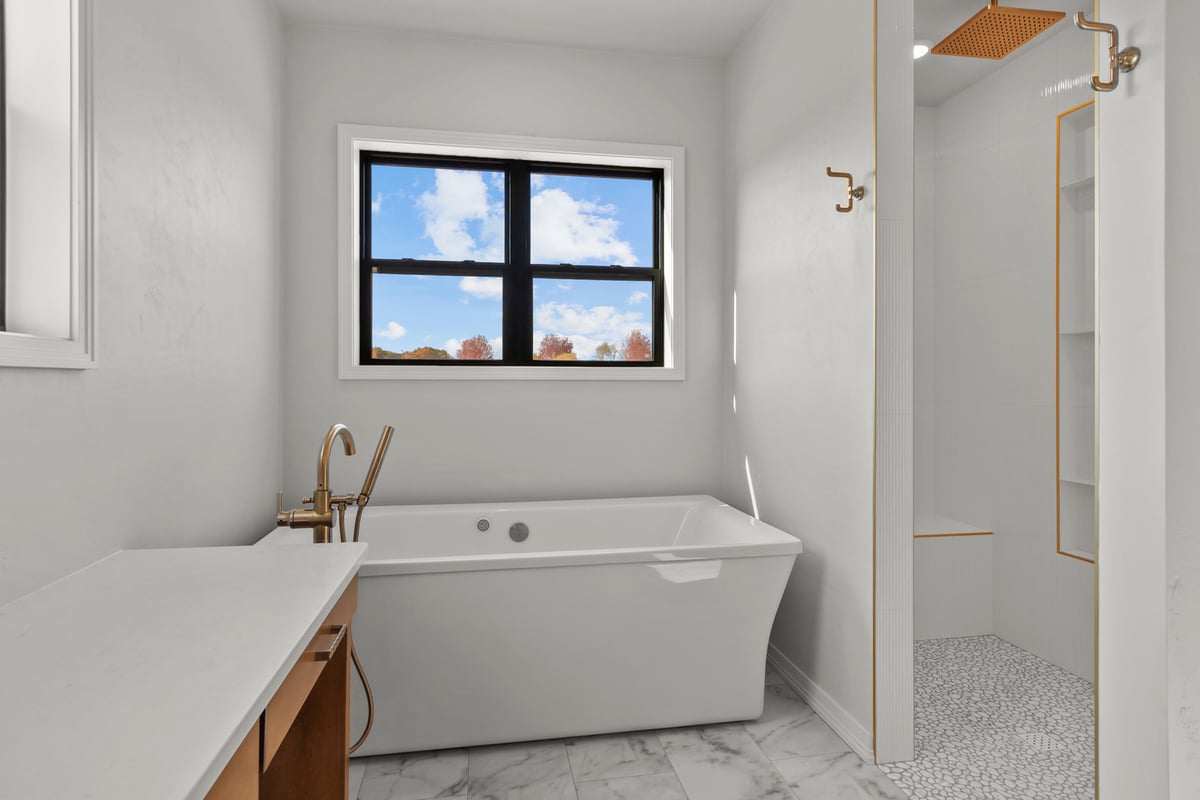 Master bath with soaking tub and shower by Midwest Design Homes in Fremont, Wisconsin