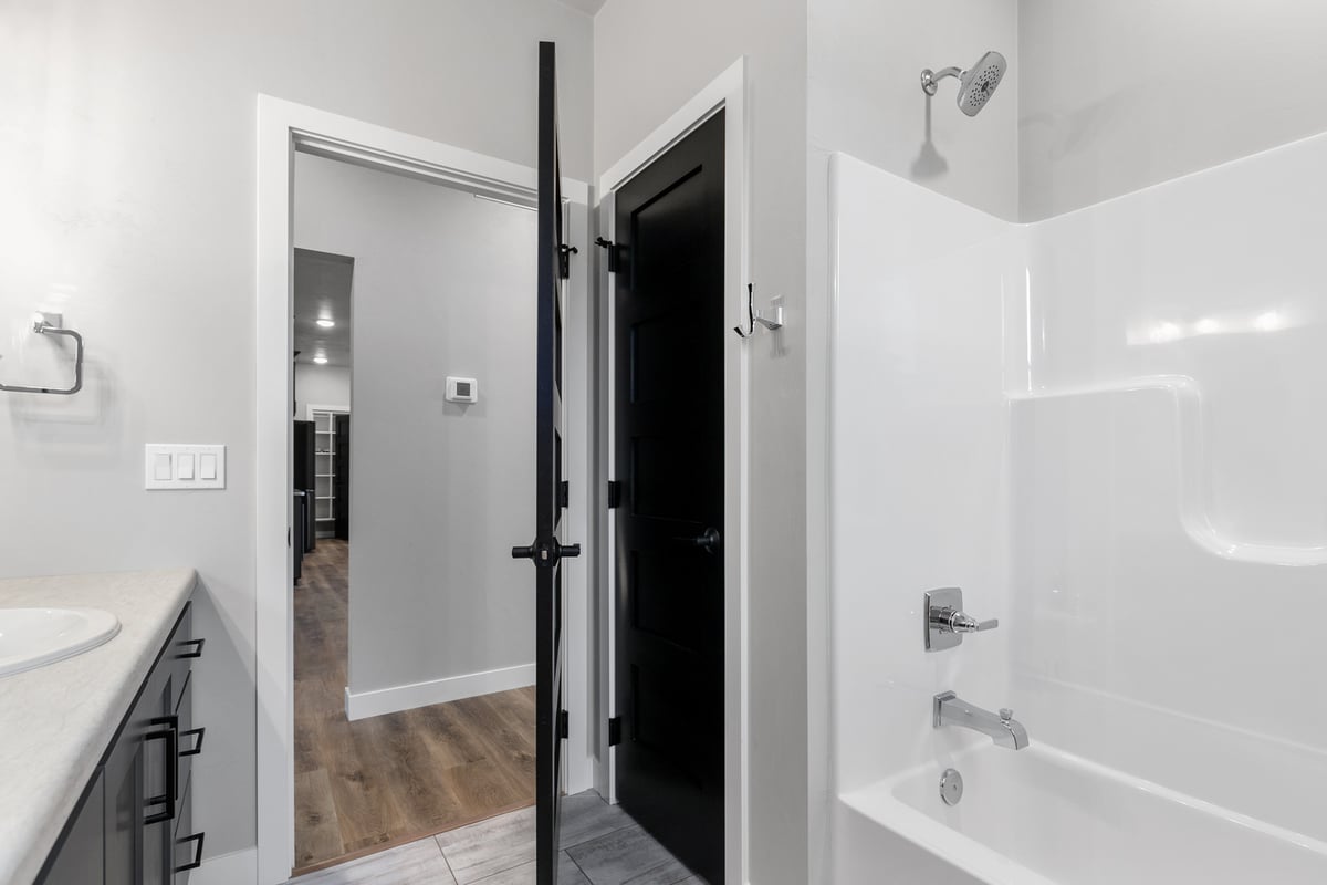 Bathroom view from hallway in custom home by Midwest Design Homes in Kaukauna, Wisconsin