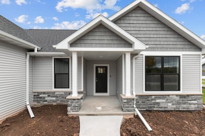 Covered front entry of new custom home by Midwest Design Homes in Kaukauna Wisconsin