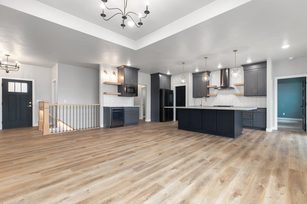 Kitchen and entry view in Kaukauna custom home by Midwest Design Homes