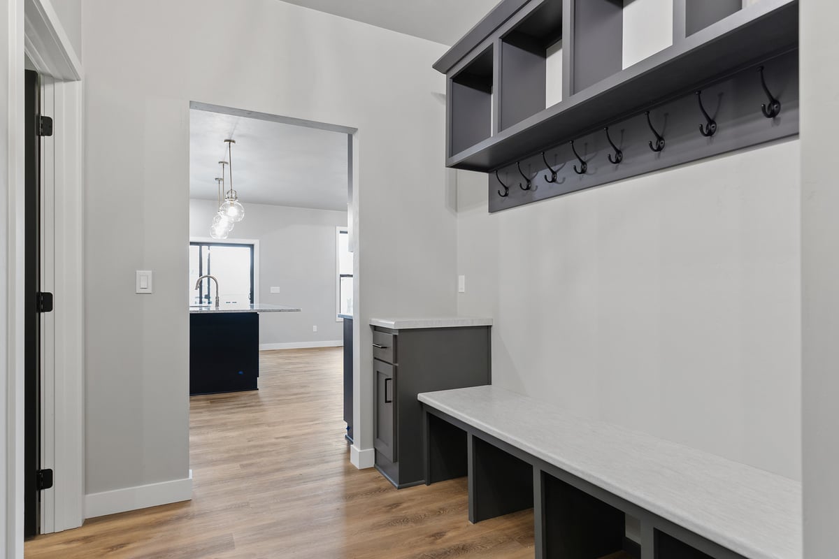 Organized mudroom space with storage by Midwest Design Homes in Kaukauna custom home