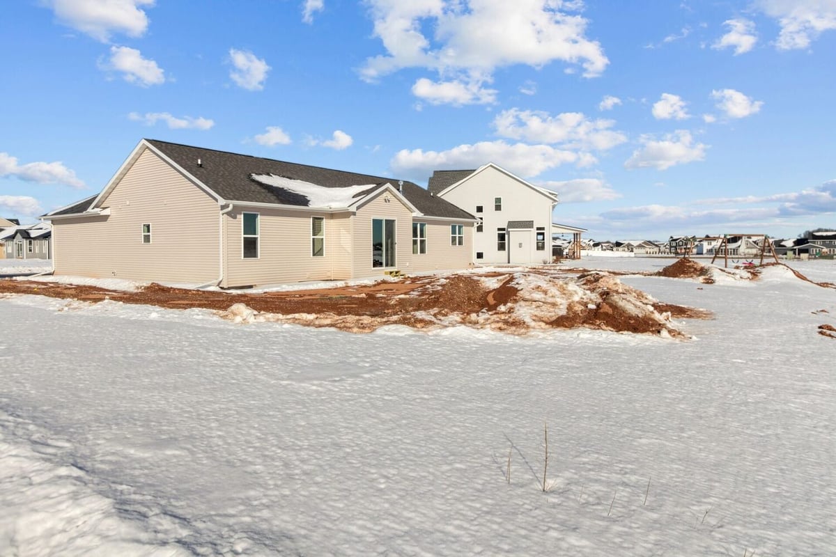 Backyard view of custom home build by Midwest Design Homes in Kaukauna, Wisconsin