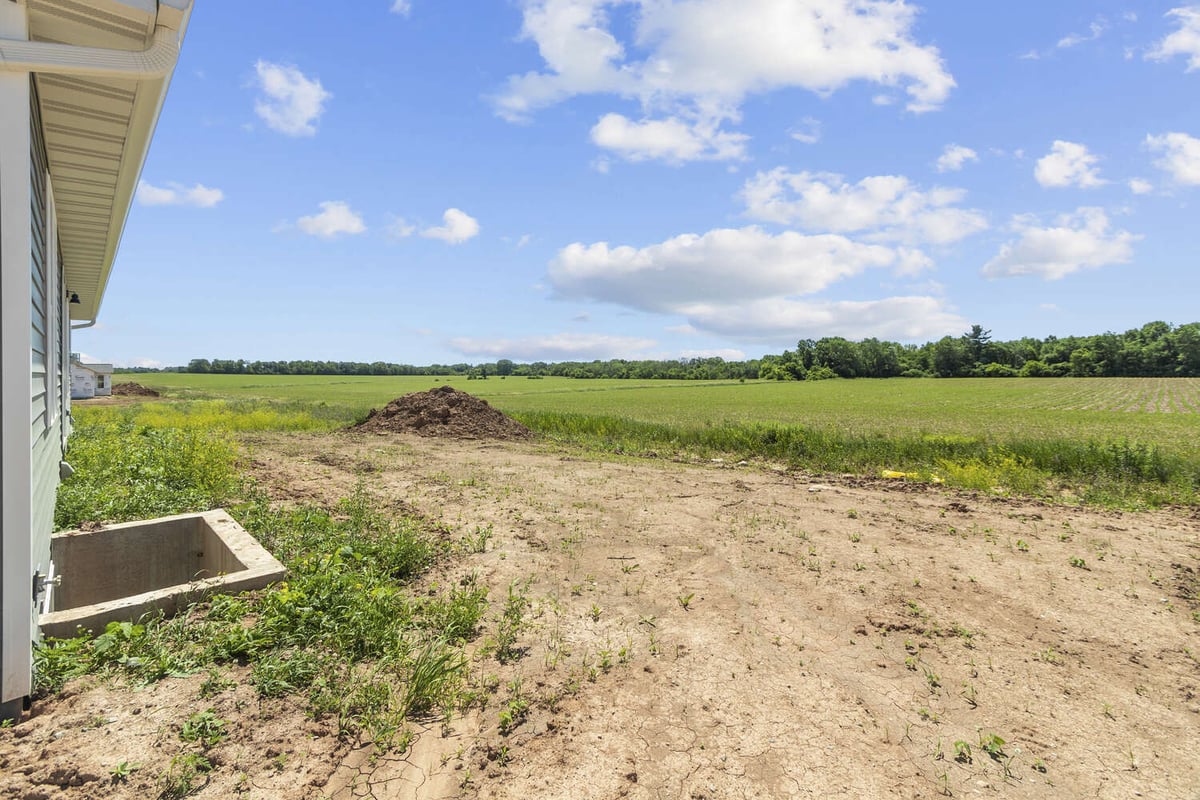 Graded land surrounding custom home project by Midwest Design Homes in Green Bay, WI