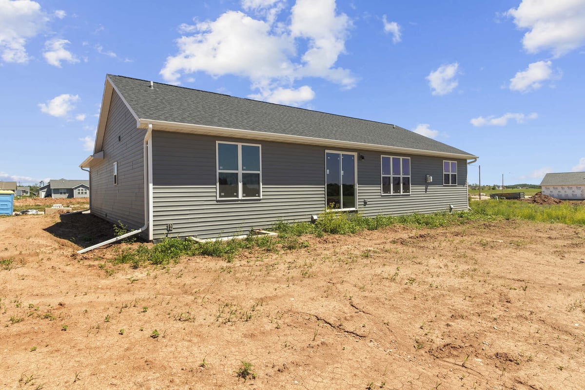 Rear exterior view of a new custom home by Midwest Design Homes in Appleton, WI