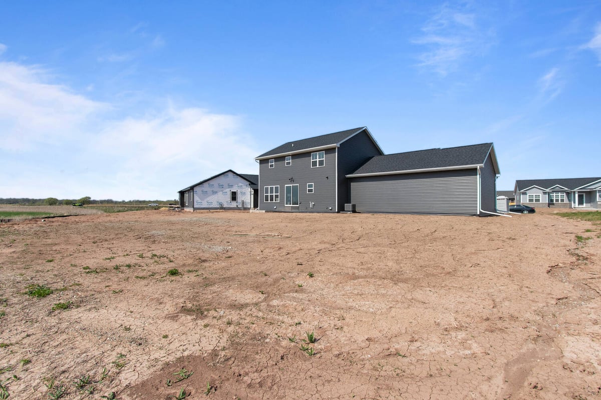 Backyard view of a modern custom home built by Midwest Design Homes in Appleton, WI