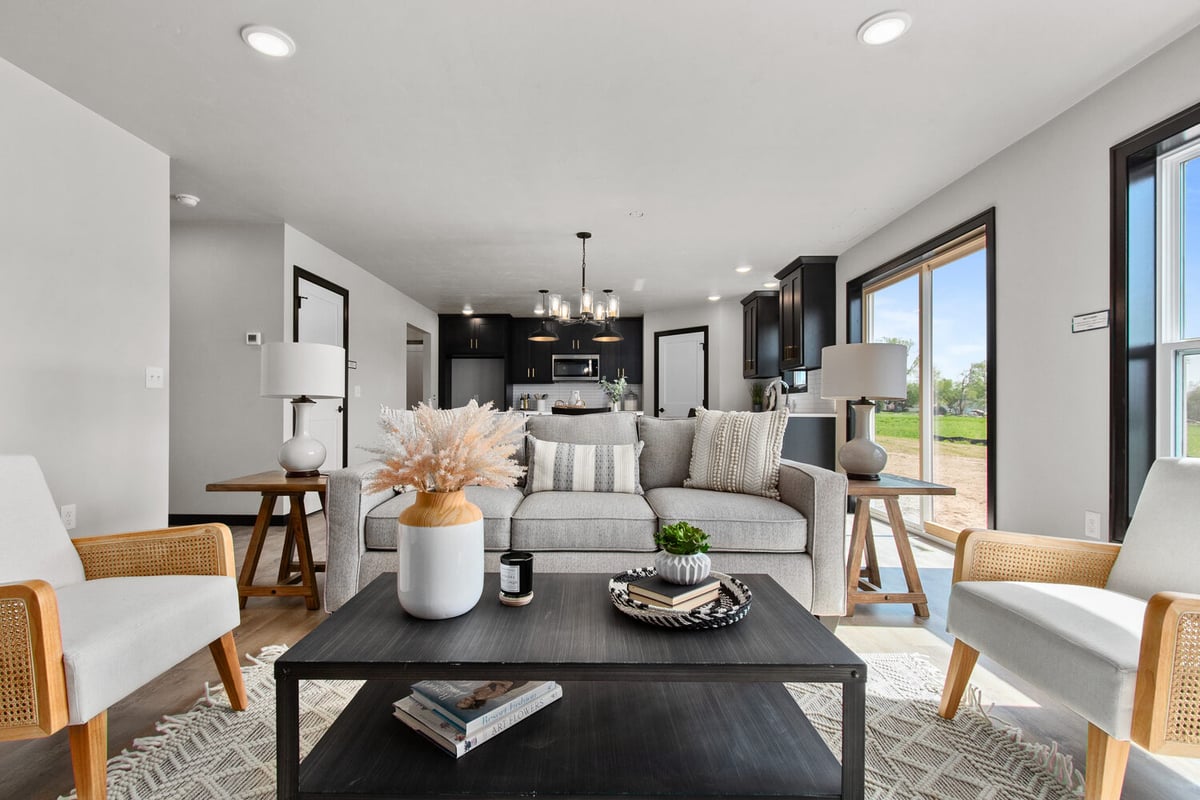 Bright custom living area with large windows in Kaukauna WI by Midwest Design Homes