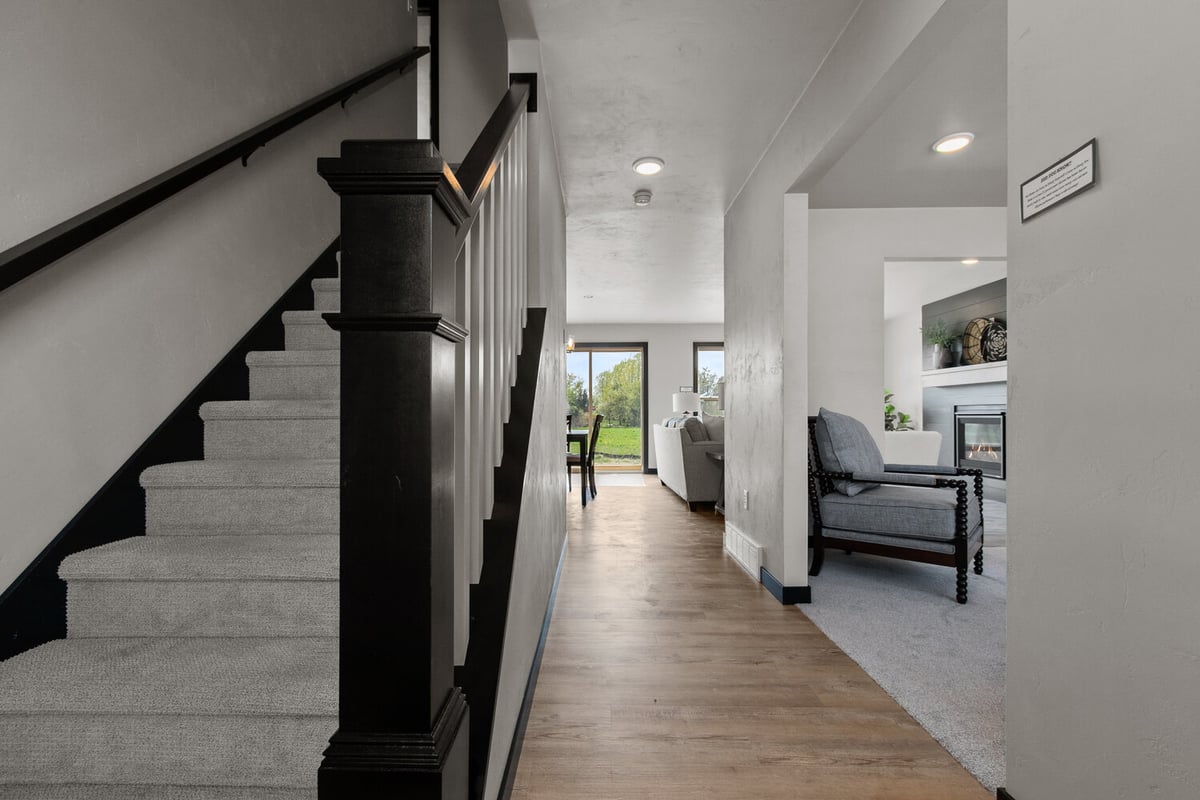 Custom home entry and staircase by Midwest Design Homes in Greenville, WI