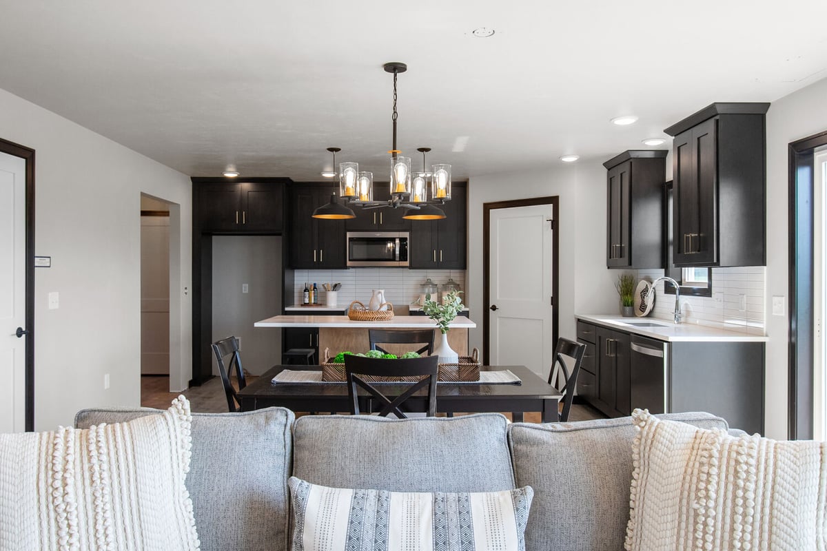 Custom home kitchen view from living room by Midwest Design Homes in Fox Cities, WI