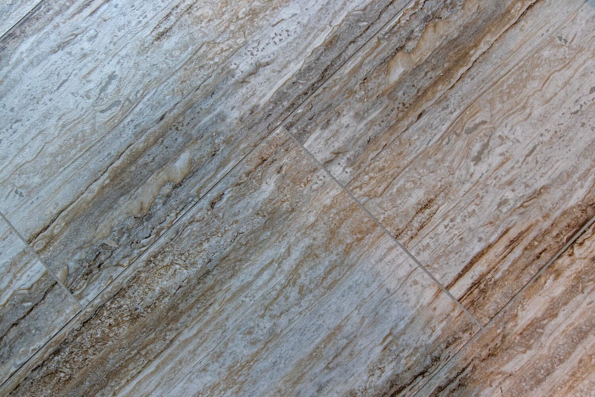 Durable and stylish tile flooring featured in a Fox Cities custom home by Midwest Design Home